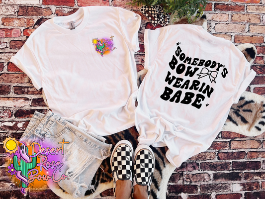 Somebody’s Bow Wearin Babe Logo Tee
